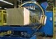 Compact horizontal orbital stretch wrapper
