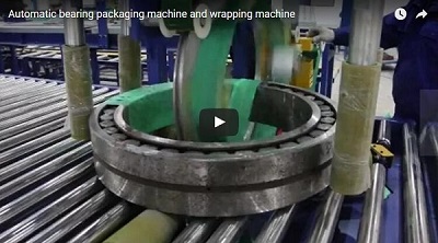 Automated bearing wrapping machine in operation