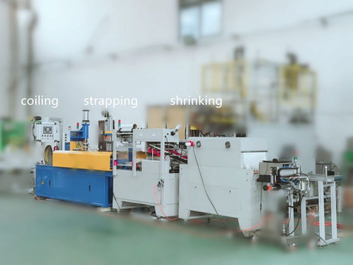 coiling - strapping and shrinking machine