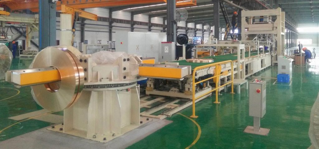 C. SLITTING COIL PACKING AND STACKING LINE