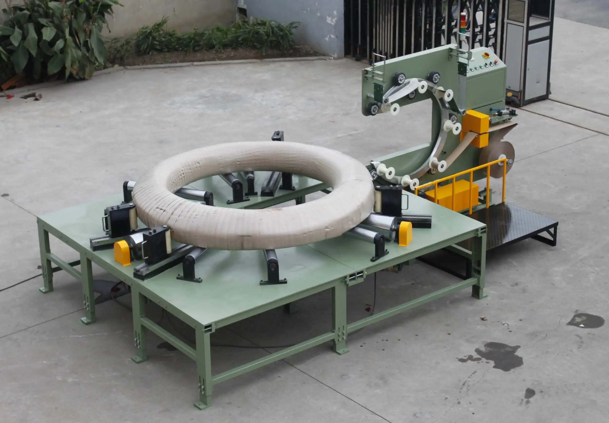 A wire wrapping machine with a wound spool ready for film