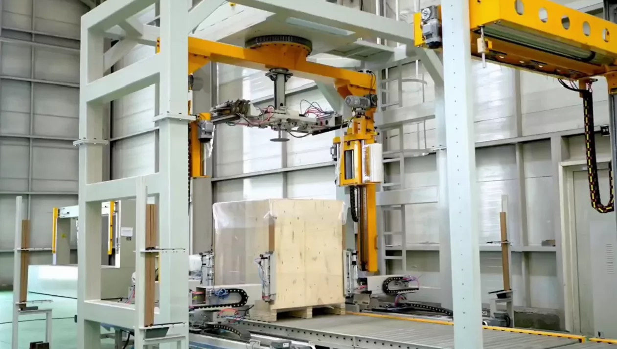 An automatic rotary arm wrapper