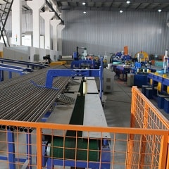 Automatic steel tube strapping machine