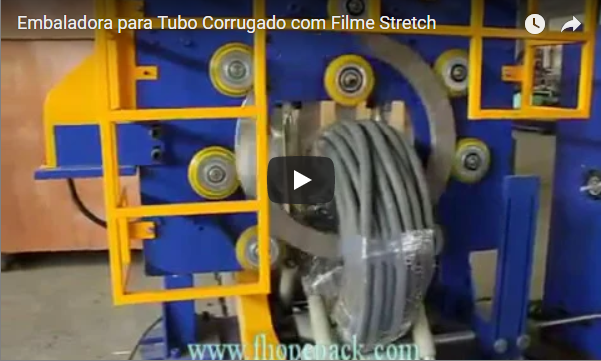 Coil wrapping machine for corrugated hose coil
