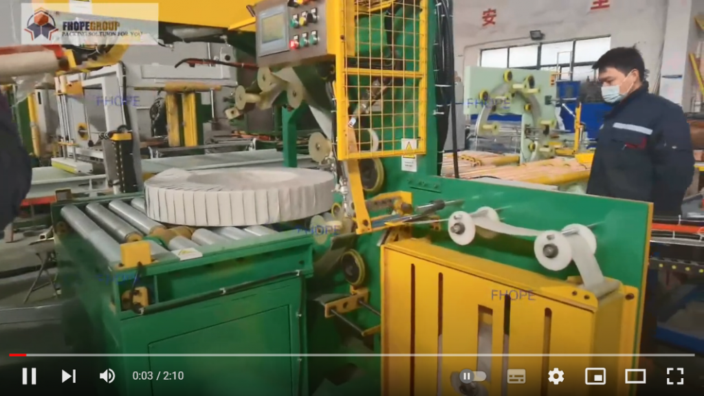 Automatic coil wrapping machine with side tape applicator Automatic coil wrapping machine with side tape applicator