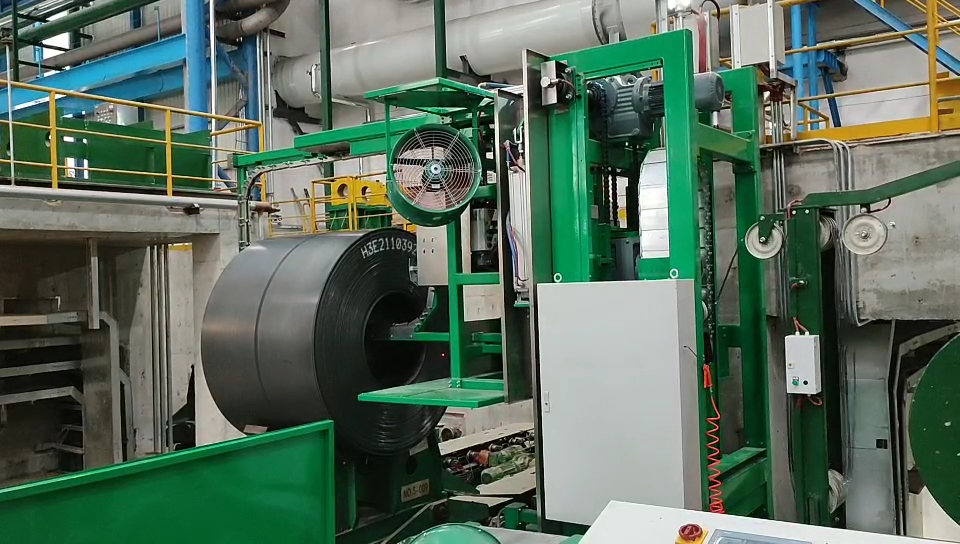 Hot roll steel coil strapping machine