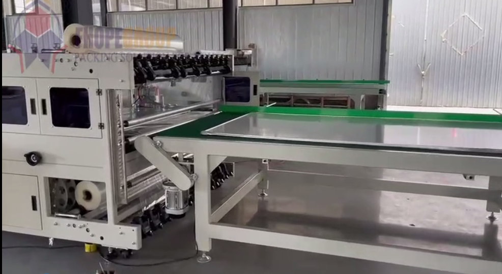 Automatic panel sealing and shrinking machine