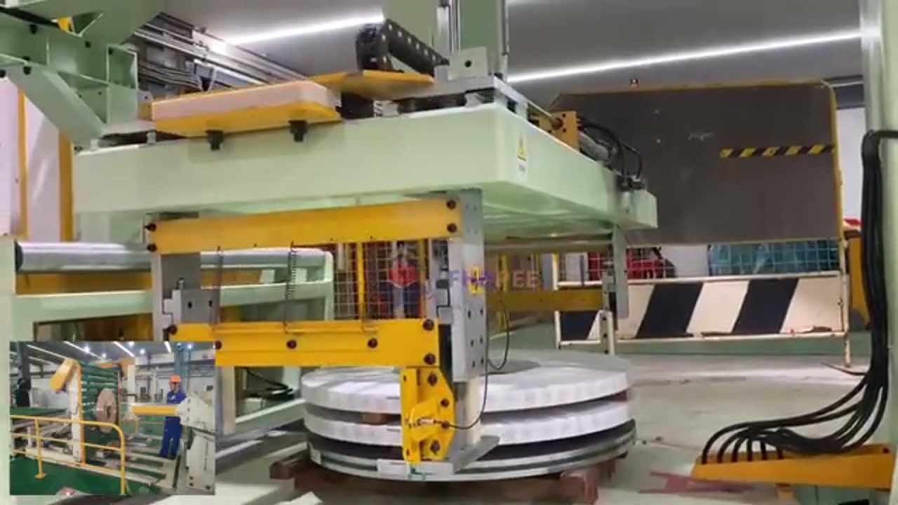 Film-wrapped slit coils resting on a pallet near the end of the reviewed clip