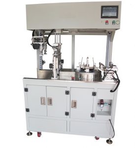 Automatic coiling and strapping machine