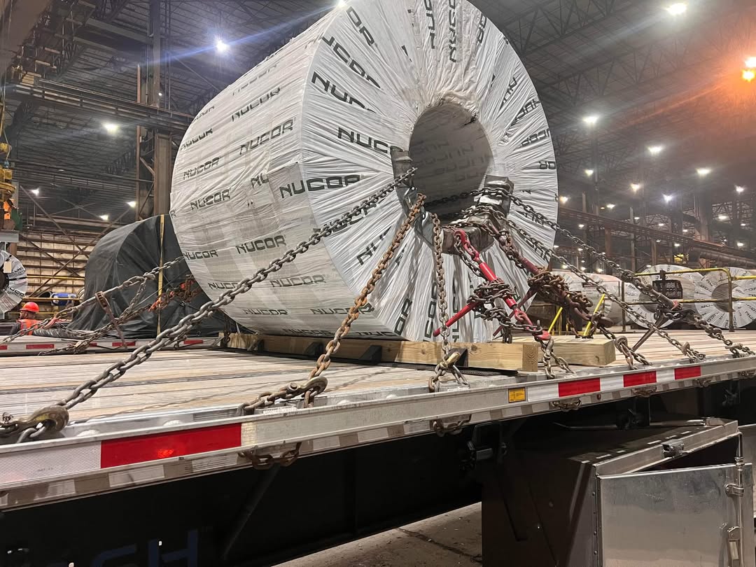 How are steel coils transported?